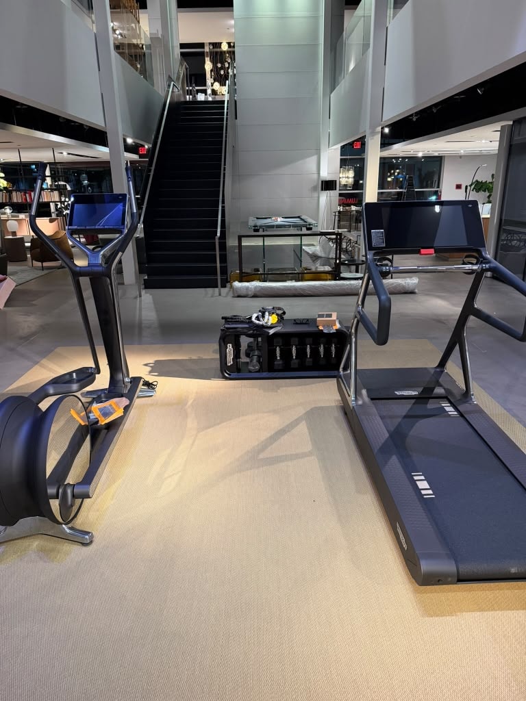 Fitness equipment showroom with treadmills and ellipticals