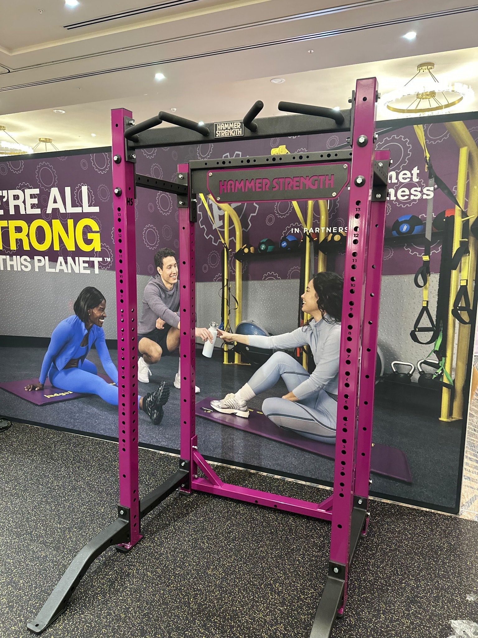StrongArm team setting up Planet Fitness trade show booth