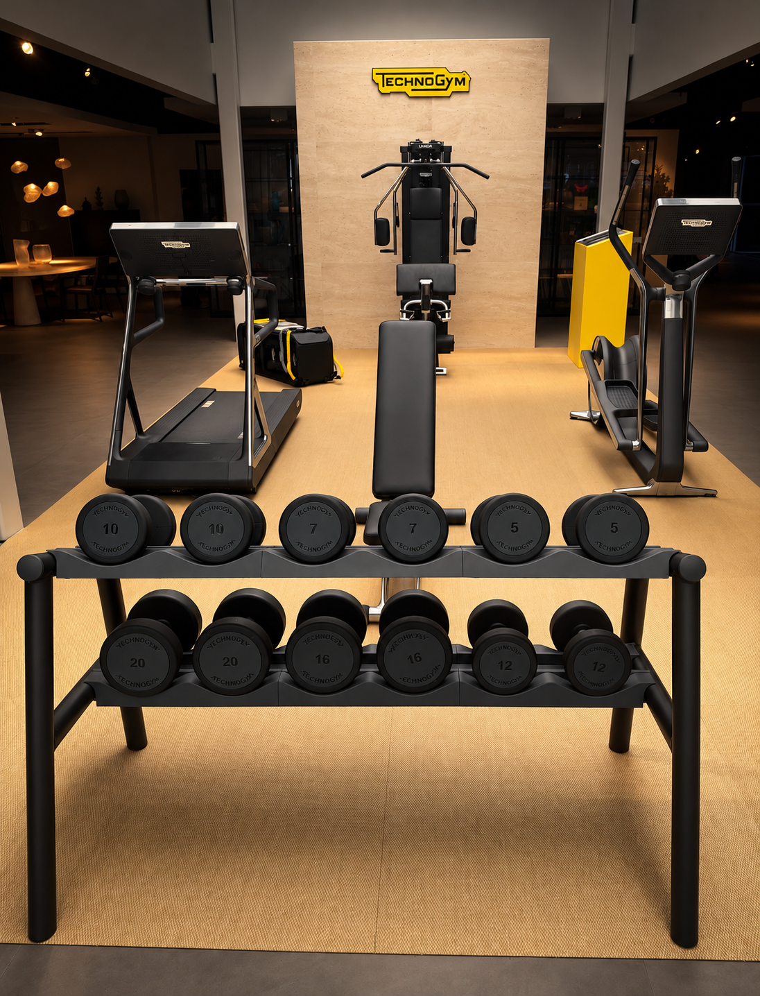TechnoGym showroom with dumbbells and fitness equipment